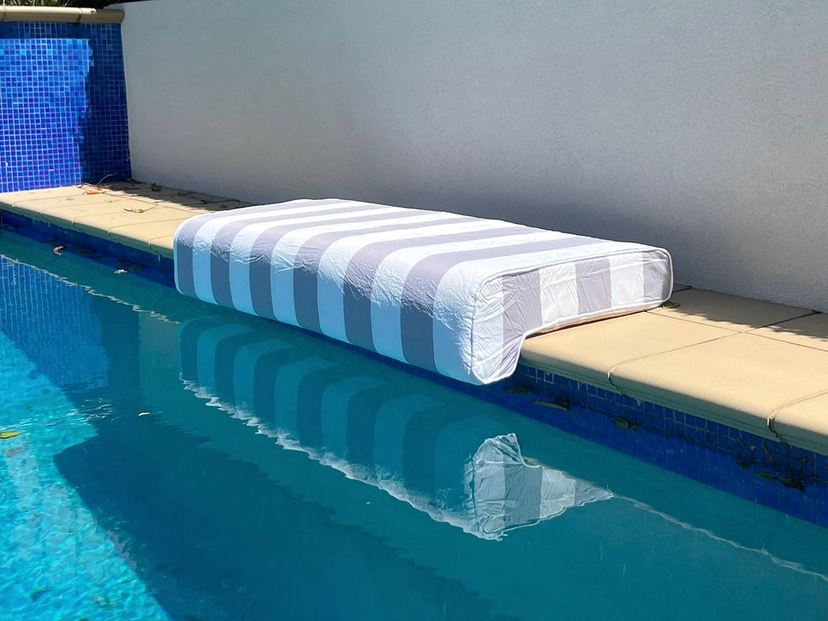 Splash Haus double pool cushion on pool coping