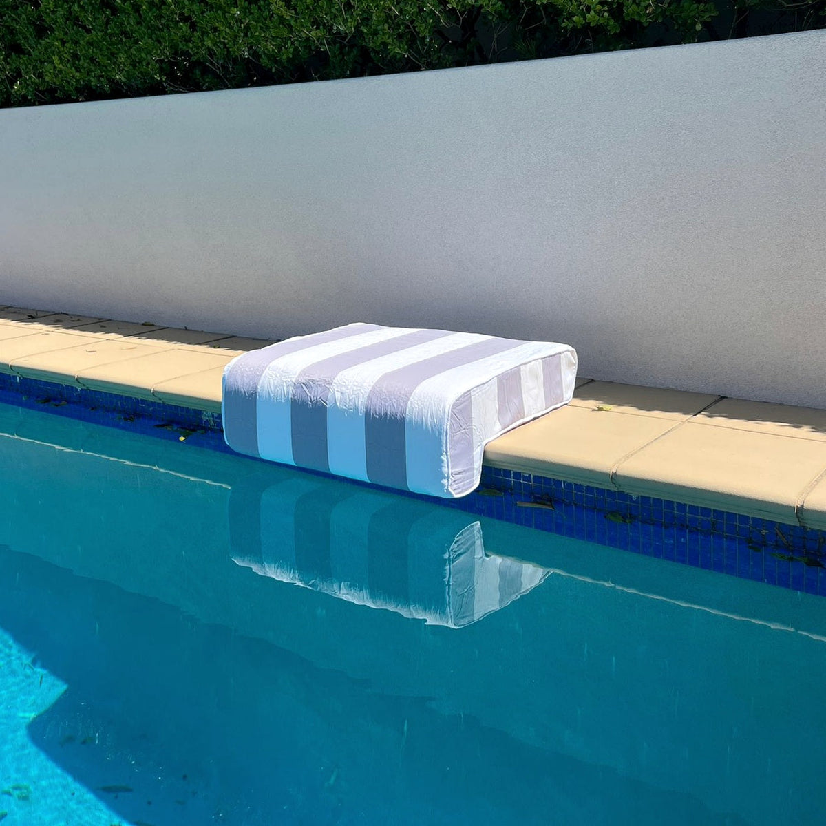 Splash Haus single pool cushion new design beside pool